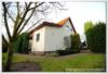 RESERVIERT: Komfortables Einfamilienhaus inklusive Nebengelass und Gartenparadies in Mahlsdorf - Rückansicht Haus