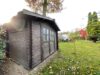 Einfamilienhaus im Bungalowstil inkl. Vollkeller, Sauna, Wintergarten, Kaminofen und großem Grundstück in Nassenheide! - Holzhaus