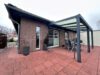 Reserviert - Modernes und energieeffizientes Einfamilienhaus mit massiver Garage - überdachte Terrasse