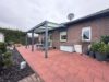 Reserviert - Modernes und energieeffizientes Einfamilienhaus mit massiver Garage - Terrassenansicht