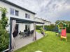Moderne Doppelhaushälfte mit Terrasse, Fernwärme und zwei Stellplätzen in Velten - Terrassenansicht