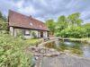 6 Zimmer, auf ca. 257 m² Gesamtfläche, traumhafter Garten, Doppel-Fertigteilgarage mit blick aufs Feld - Hausansicht