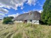 Bauernhaus mit Stallung und Wiesen - hintere Hausansicht