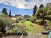 Doppelhaushälfte inkl. Vollkeller in einer ruhigen und familienfreundlichen Lage! - Blick in den Garten