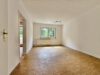 Eigentumswohnung mit 3 Zimmer und Balkon im Erdgeschoss - Wohzimmer