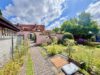 Reihenmittelhaus in Zentraler Lage mit großem Grundstück und Garage - Gartenansicht