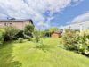 Einfamilienhaus im Bungalowstil mit Carport und überdachter Terrasse - Grüneberg - hintere Grundstücksansicht